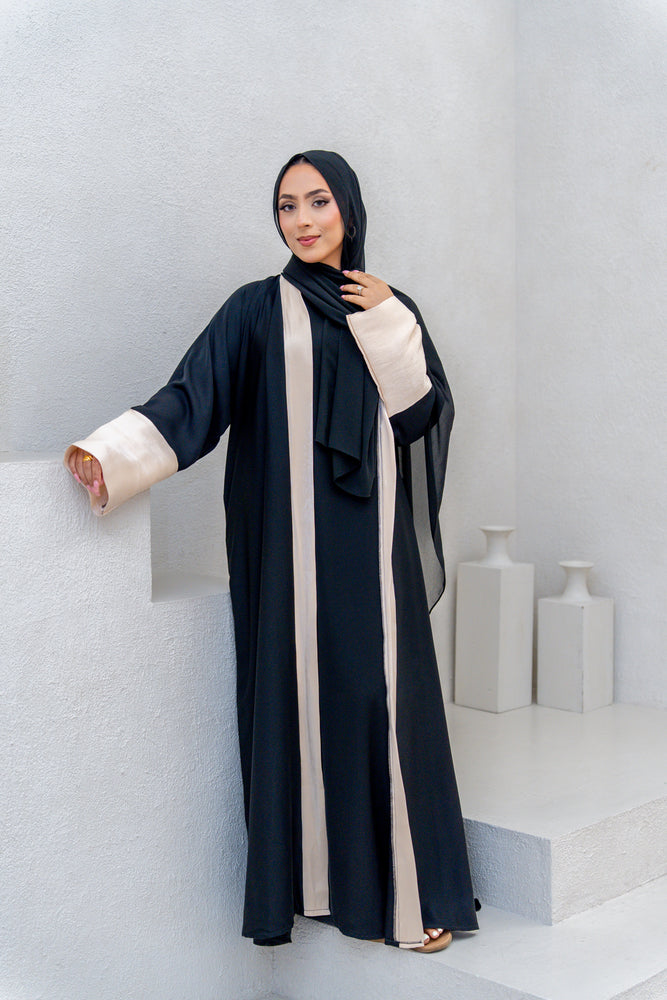 
                  
                    Black and Beige Abaya
                  
                