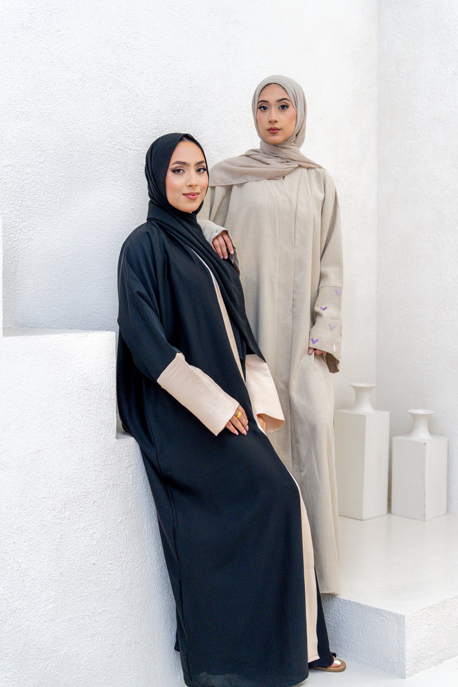 
                  
                    Black and Beige Abaya
                  
                
