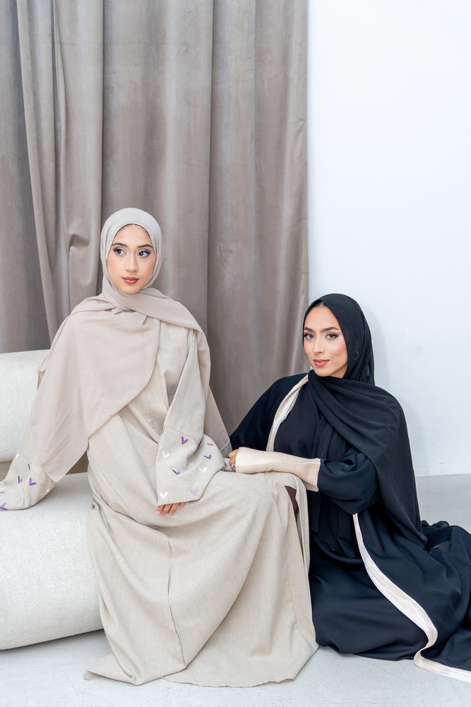 
                  
                    Black and Beige Abaya
                  
                