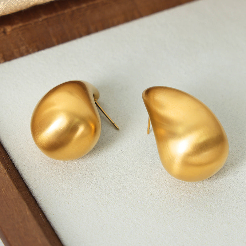 
                  
                    Matte teardrop studs
                  
                